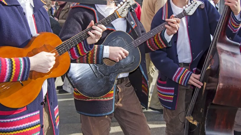 Traditional Croatian musicians in Slavonian costumes play in the city square