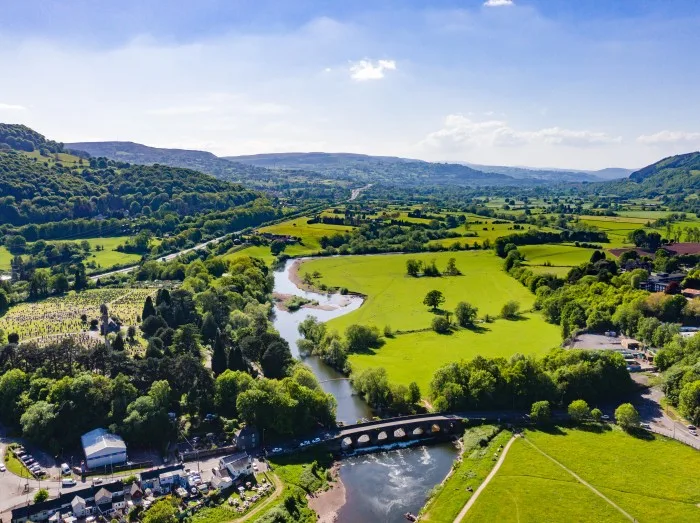 Aerial view of an old bridge over the River Usk in Abergavenny