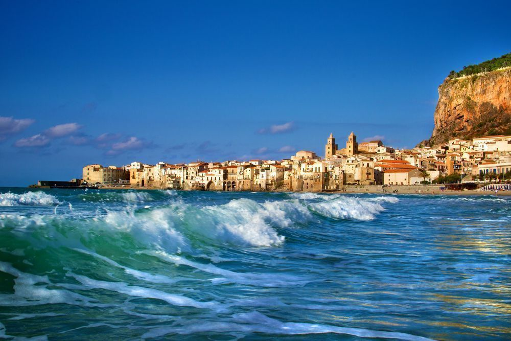 Hold badeferie fra et feriehus på den Sicilienske kyst