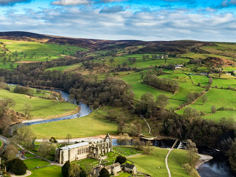 12th-century Augustinian monastery ruins of Bolton Abbey on the banks of the River Wharfe in North Yorkshire, England