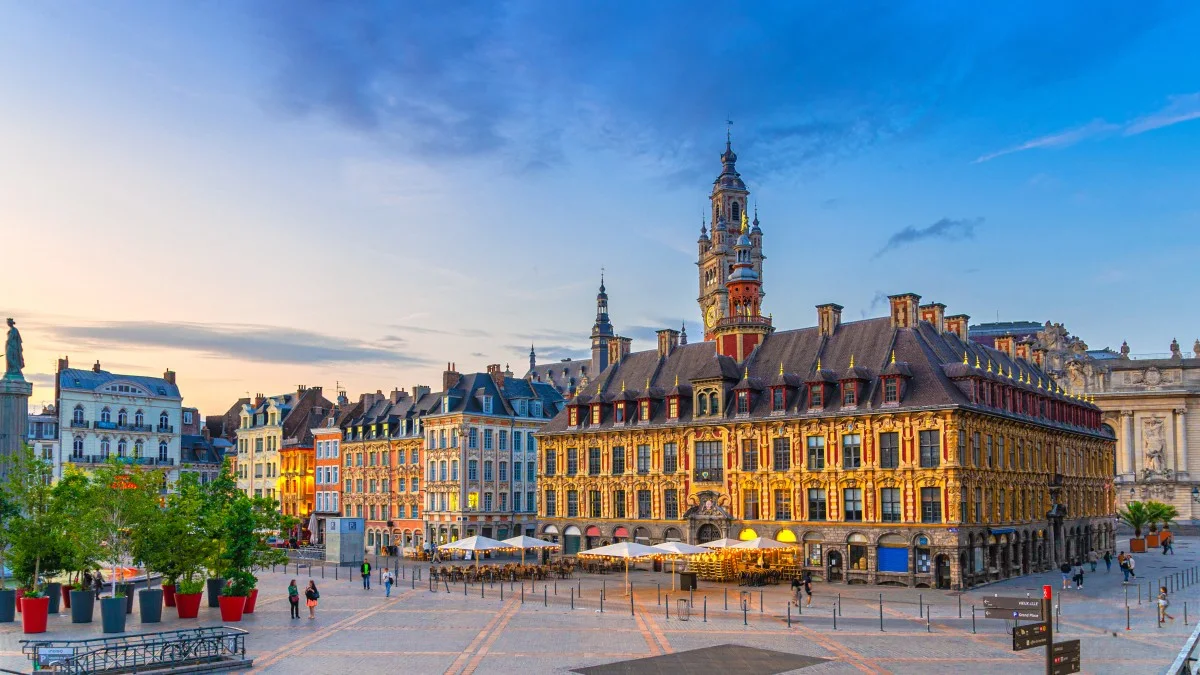 Lille cityscape, La Grand Place square in city center, historical monument 