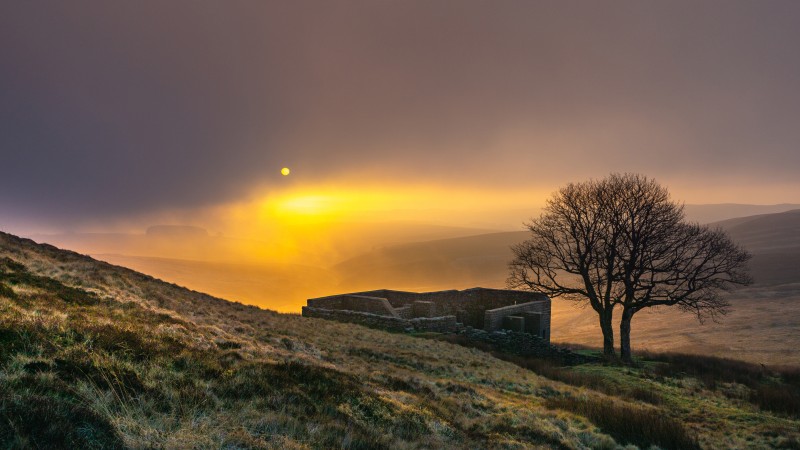 Sunrise of Top Withens or Top Withins, this farmhouse has been associated with `Wuthering Heights'.