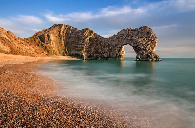 View of Durdle Door, the iconic rock arch on the Jurassic Coast in Dorset, England, UK