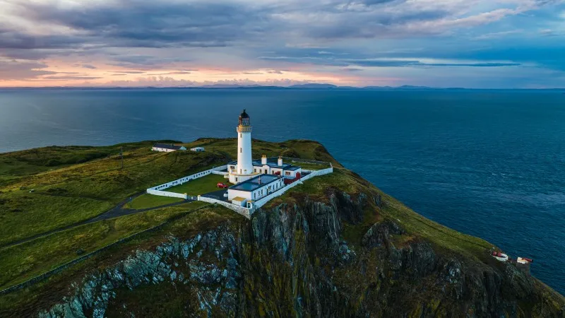 Sunset over Mull of Galloway Lighthouse from a drone, Mainland Scotland