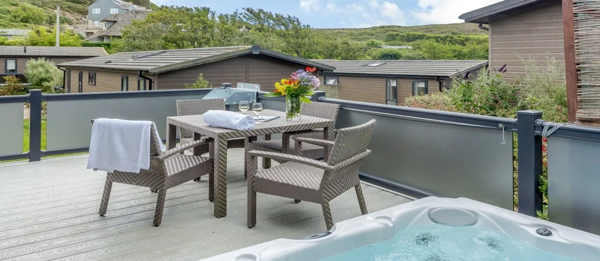 Luxury hot tub lodge at Mullion Cove Coastal Retreat in Mullion Cove, Helston, South Cornwall, UK