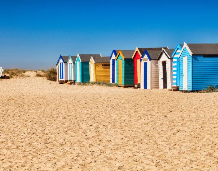 Colourful beach huts on Southwold Beach in Suffolk, UK