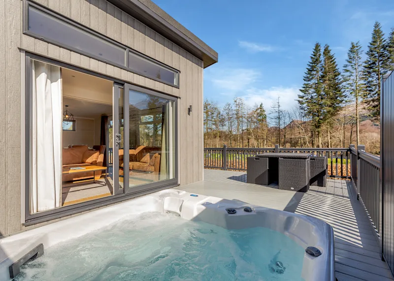 Hot tub lodge at Ben Nevis Holiday Park (OCHY) in Camaghael, Fort William, Northern Highlands, Scotland, UK