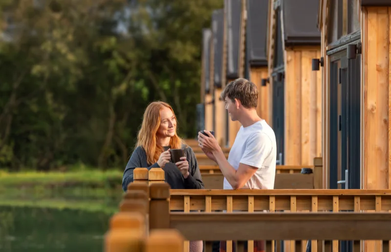 A couple outside a lodge