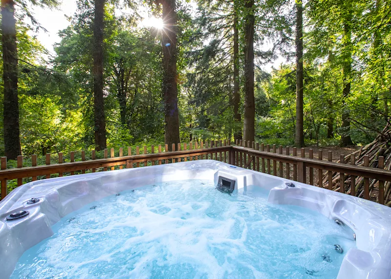 Hot tub in the woods at Garwnant Brecon Beacons (GARW) in Merthyr Tydfil, Glamorgan, Brecon Beacons, Wales, UK