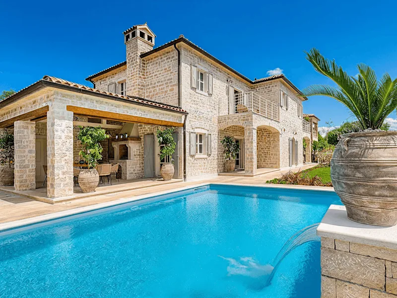 Olive groves, island light, a villa waiting