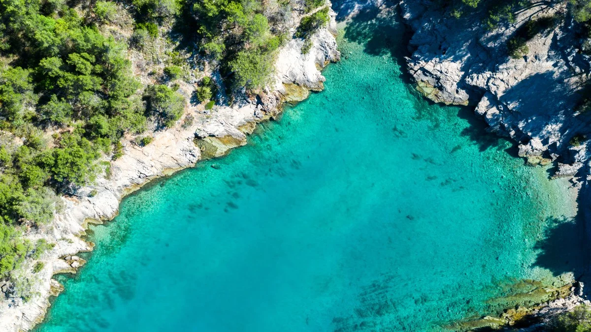 Maslinica bay near Vrboska and clear sand sea on island of Hvar