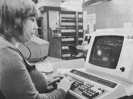 Gerry at one of the original computer terminals circa early 1980s