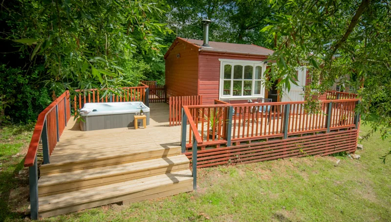 Hot tub lodge at Otter Falls (FALL) in Upottery, Honiton, South Devon, England, UK