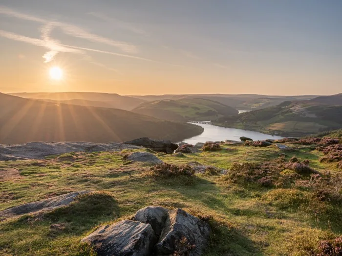 View of the Ashopton Viaduct, Ladybower Reservoir, and Crook Hill in the Derbyshire Peak District National Park.