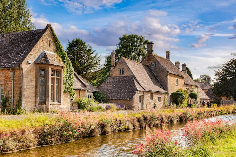 Riverside cottages in Lower Slaughter, Gloucestershire, Cotswolds, UK