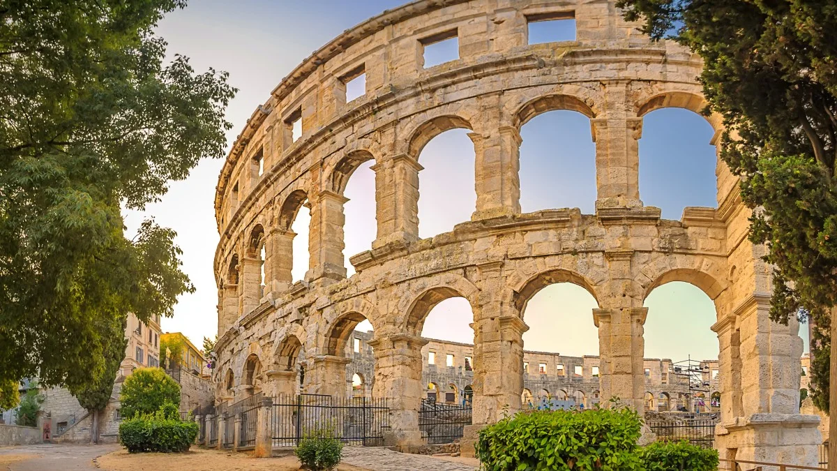Panorama medieval Ancient Roman Amphitheater in Pula at dawn, Croatia.