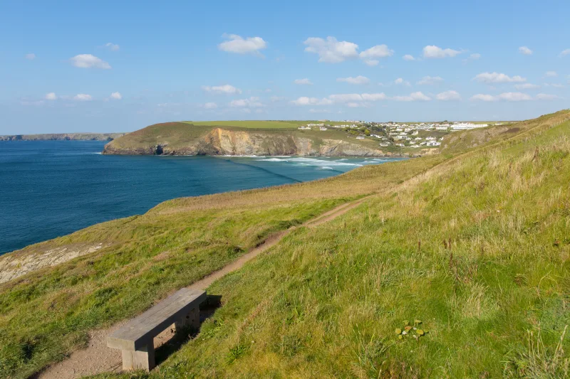 South west coast path to Mawgan Porth north Cornwall England with seat