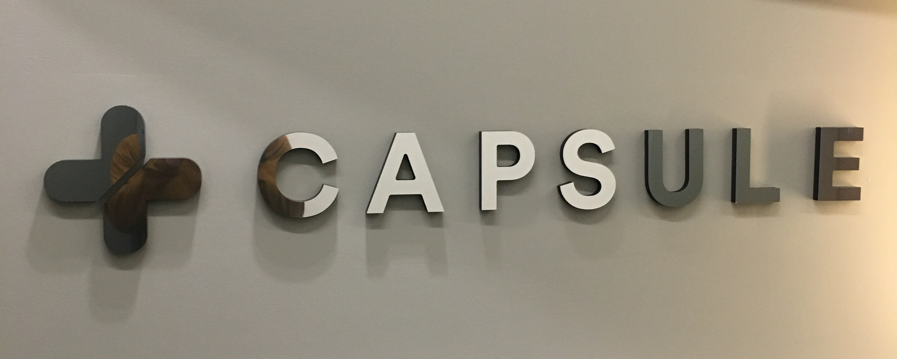 The new capsule office sign