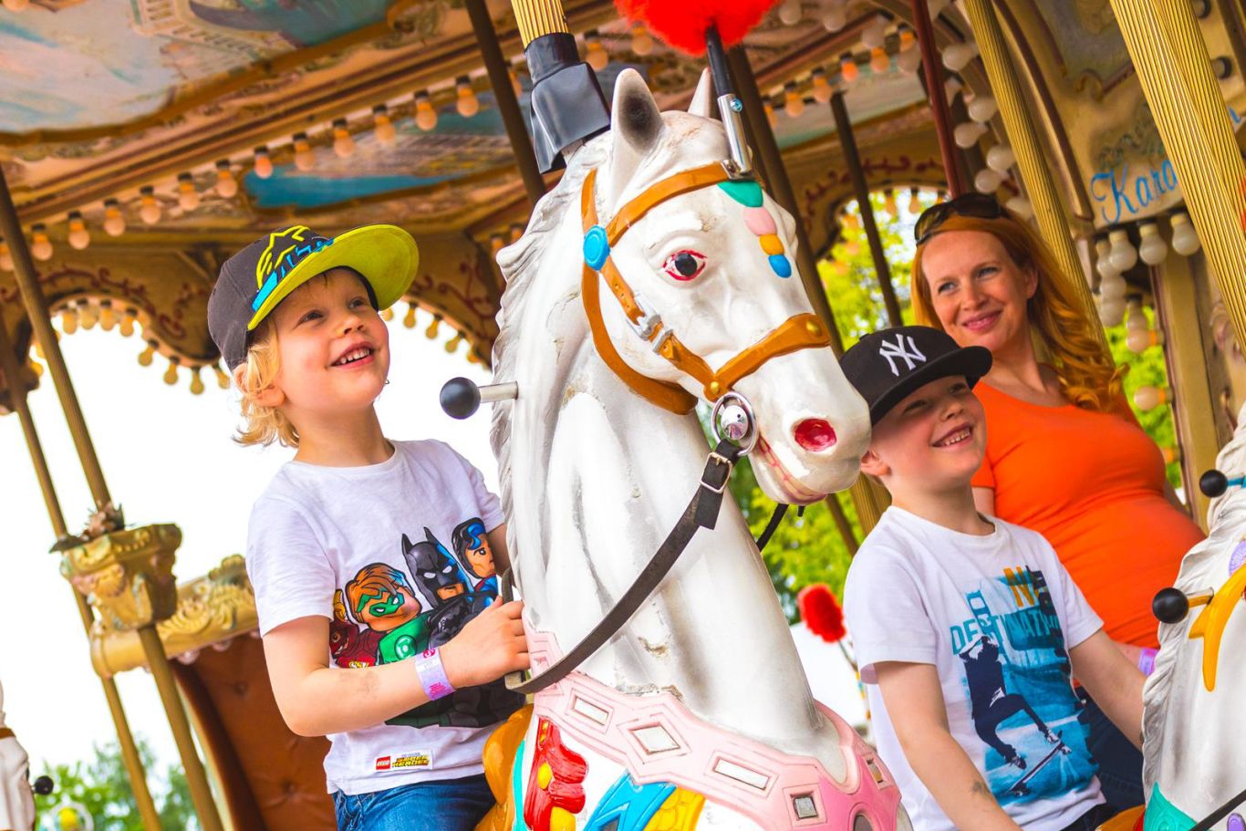 Family riding Candy Carousel