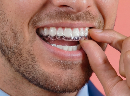 [CRO] Man - Brunette - Curly hair - Dental floss - Looking left - Lilac - T-shirt - Blue - Gradient - Background - Desktop