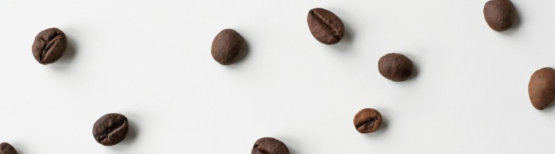 Coffee grains white background, Norwood Themes