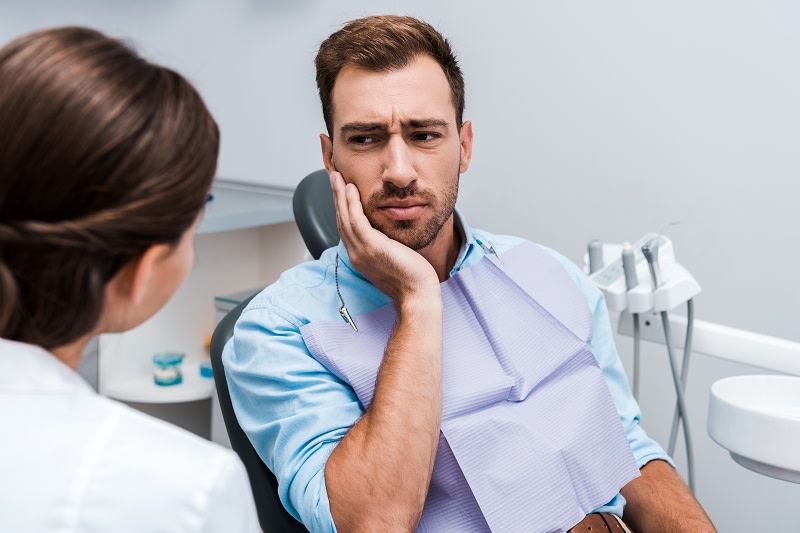 Zahnschmerzen: Ursachen, Auswirkungen & Hausmittel