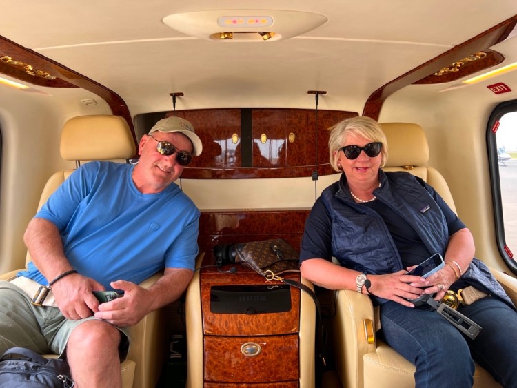 Couple Sitting in Seats on Emirates Private Jet for the Greatest Safari on Earth - ROAR AFRICA