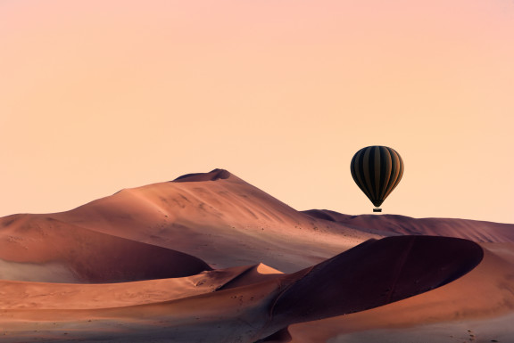 View of Hot Air Balloon over Red Sand dunes of Sossusvlei in Namibia - ROAR AFRICA