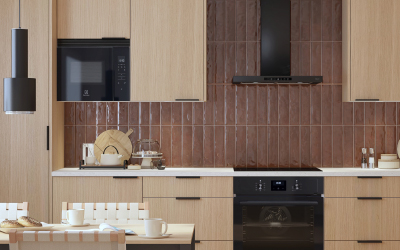 Kuvassa vaalean Cello-keittiö ja musta Cellon liesituuletin.