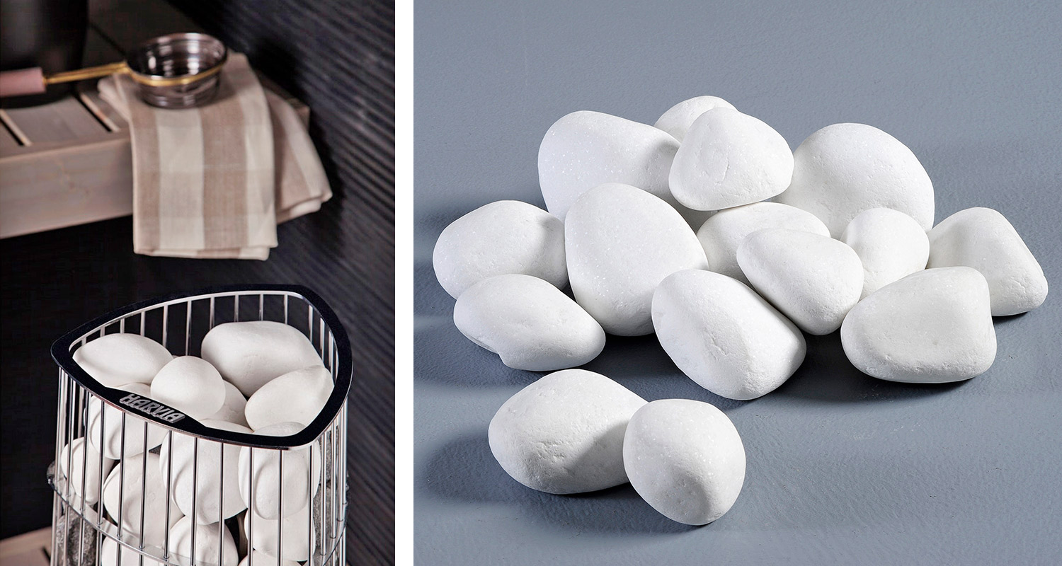 Saunan metallinen kiuaskori ja irralliset valkoiset saunakivet, puulauta, beige pyyhe ja kauha