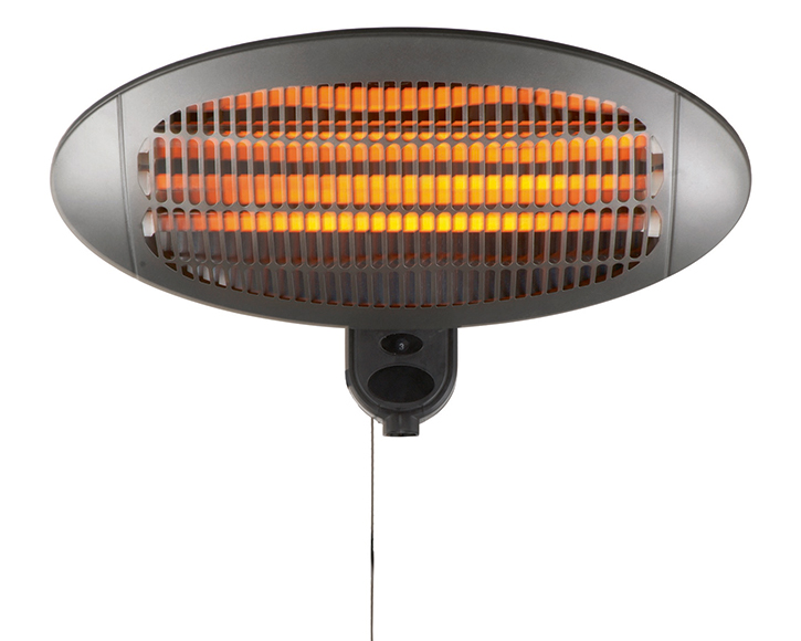 Seinään kiinnitetty harmaa infrapunalämmitin, oranssit hehkuvat vastukset ja vetokytkin.