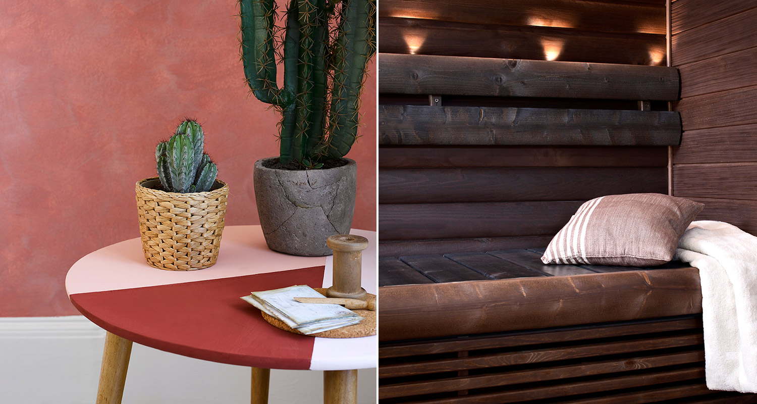 roosaksi maalattu seinä ja pöytä sekä tumma sauna