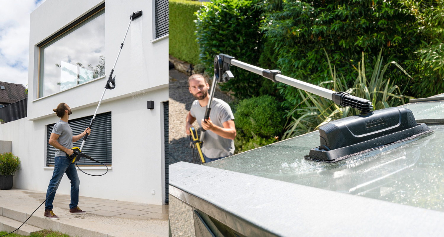 Mies pesemässä valkoisen talon korkeita ikkunoita ja lasikattoa kelta-mustalla teleskooppiharjalla.