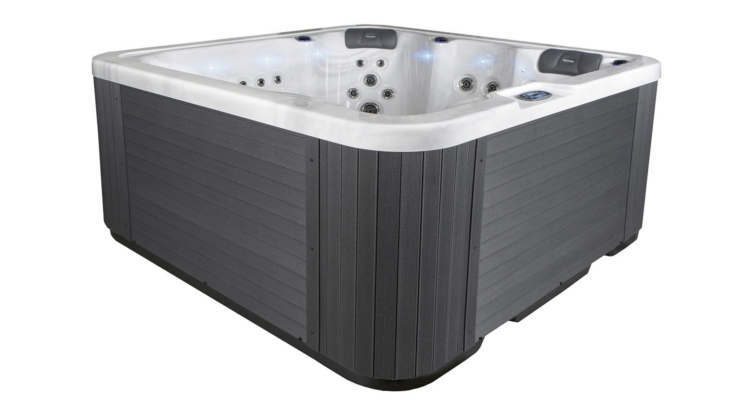 Neliömäinen harmaa ulkopaneelinen poreallas, valkoinen sisäosa, siniset LED-valot.