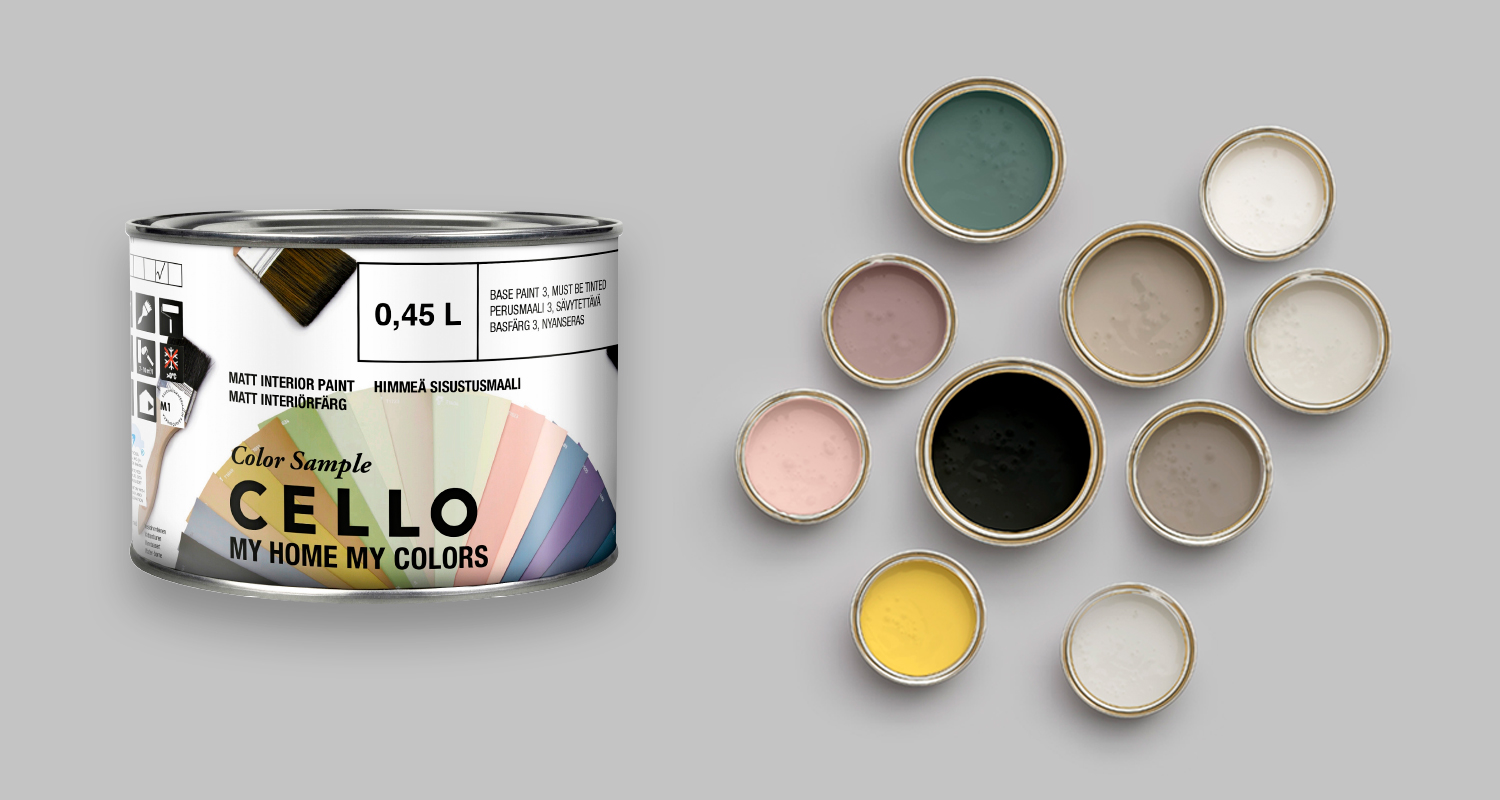 Cellon sisustusmaalipurkki ja auki olevia monivärisiä värinäytepurnukoita harmaalla pohjalla