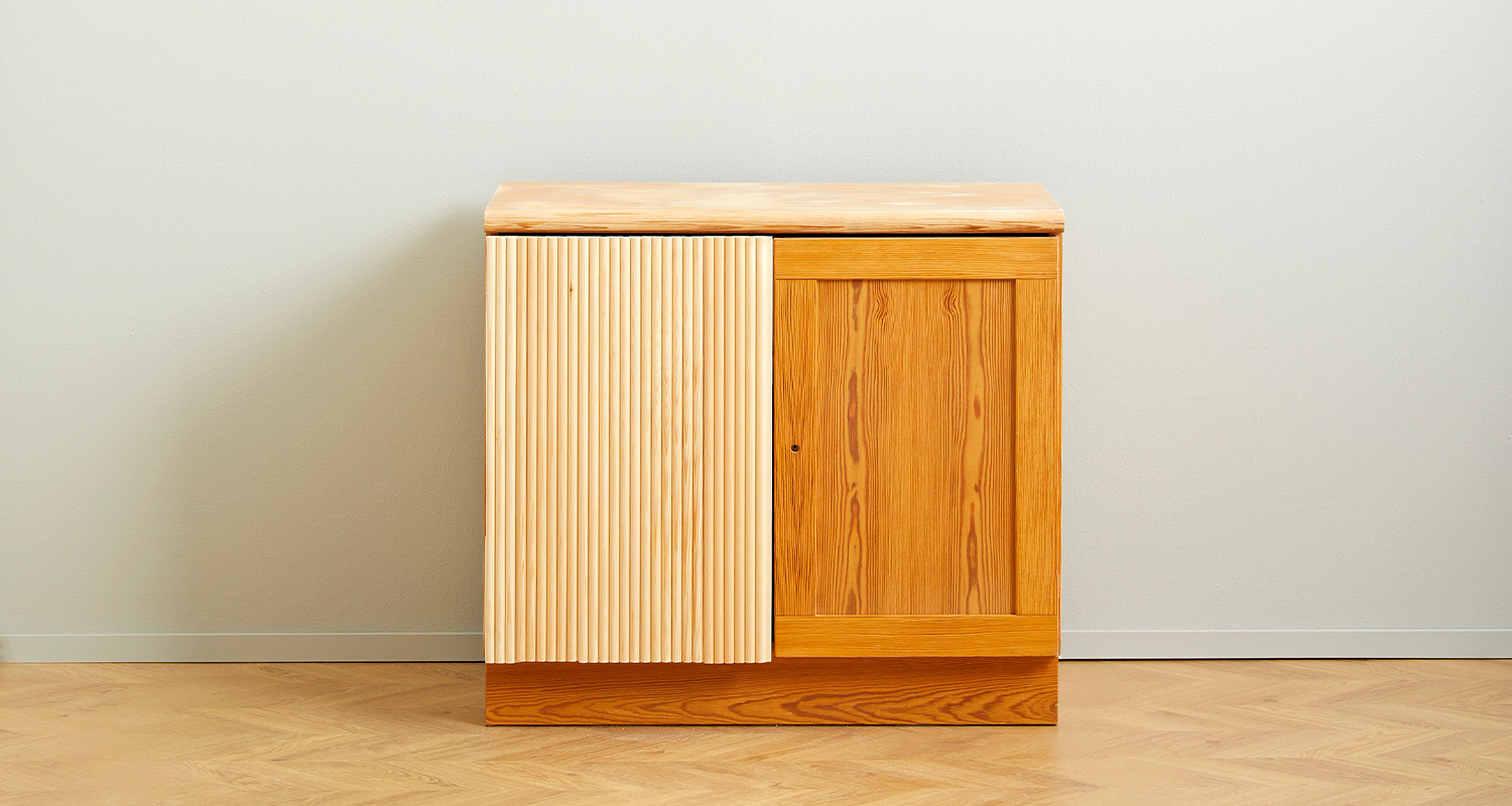 Kaapin panelointi ja maalaus. Kuvassa keltainen kaappi, joka on paneloitu ja maalattu K-Raudan ohjeilla ja tarvikkeilla.