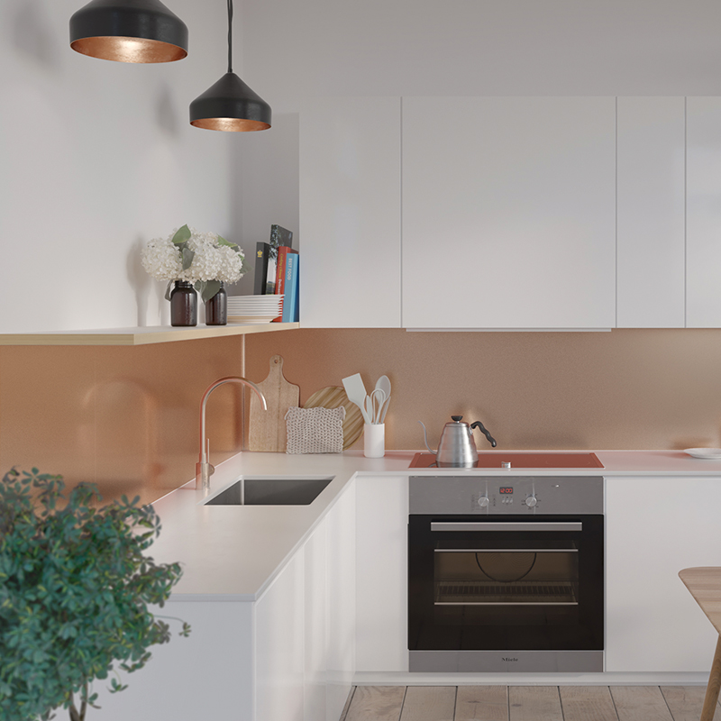 Kuvan keittiön välitilassa näyttävä, kuparinhohtoinen Fibo-välitilalevy, jota myy K-Rauta.