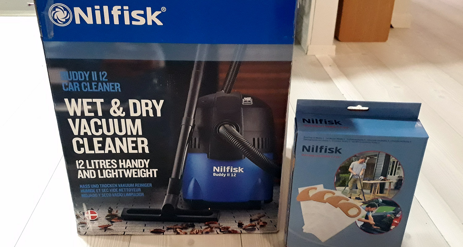 Nilfisk Buddy märkä-kuivaimurin pakkaus ja pölypussit