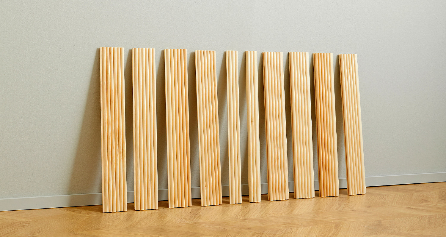 Kaapin panelointi ja maalaus. Kuvassa keltainen kaappi, joka on paneloitu ja maalattu K-Raudan ohjeilla ja tarvikkeilla.