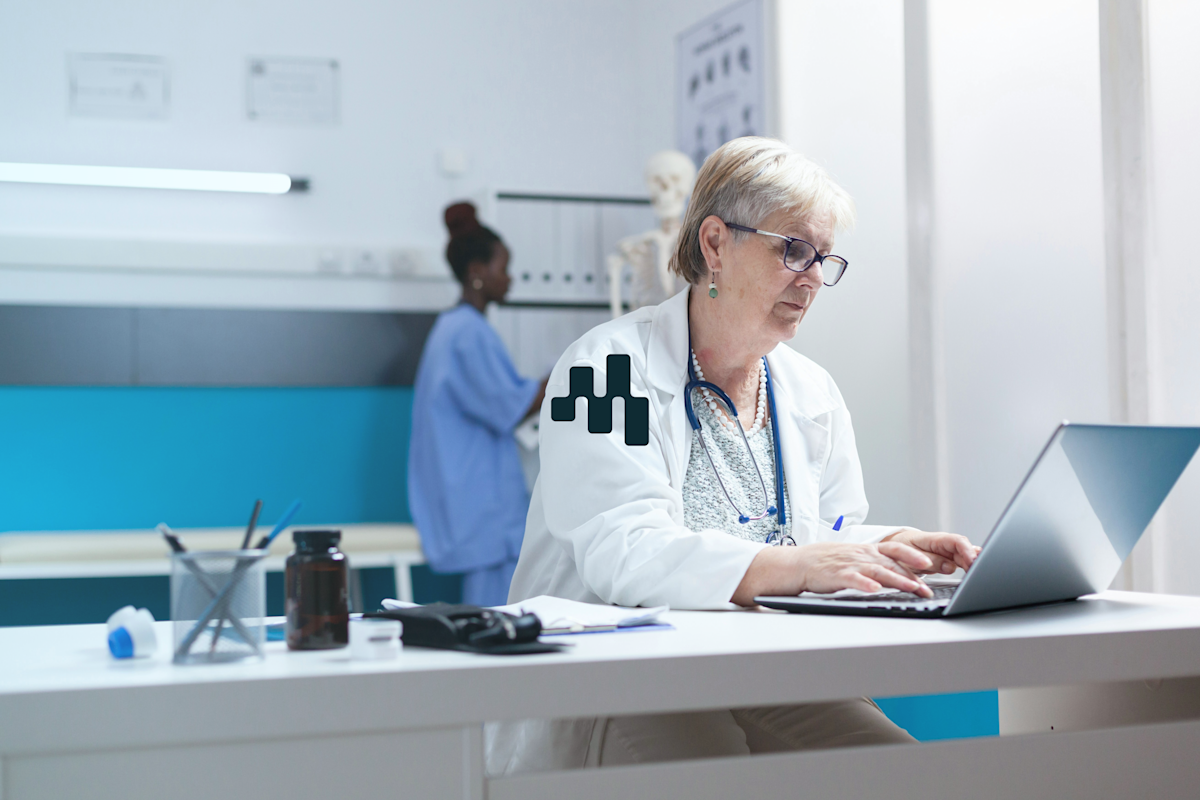 Motics - clinician at desk