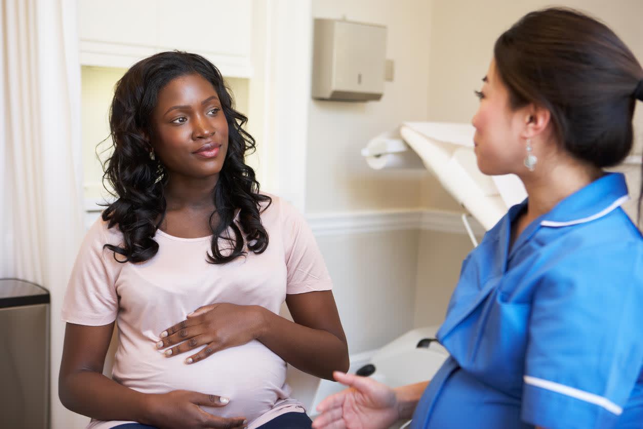 Labor and delivery nurse with patient