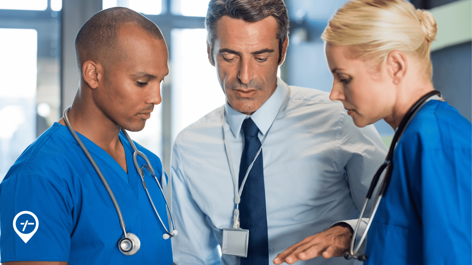 Hospital CFO and nurses reviewing healthcare workforce analytics dashboard with labor forecasting insights and financial performance metrics.