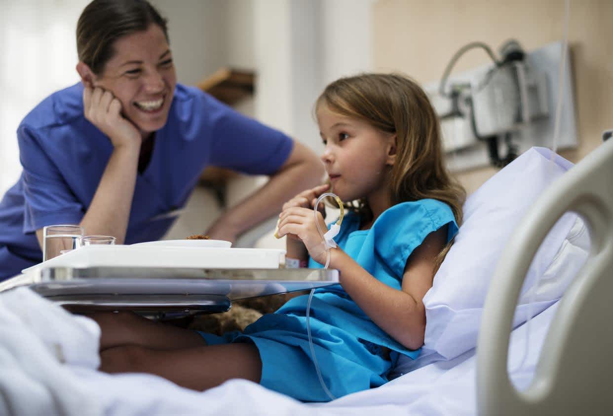 NICU Nurse with a child in the hospital