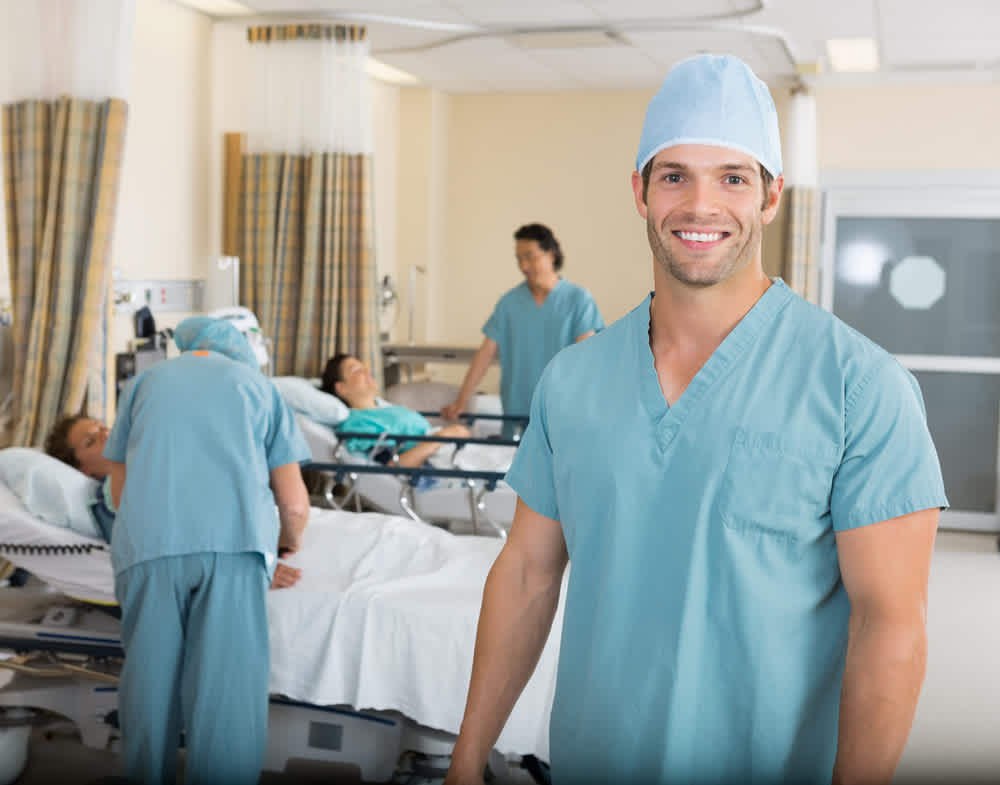 Step-down nurse standing in a ward