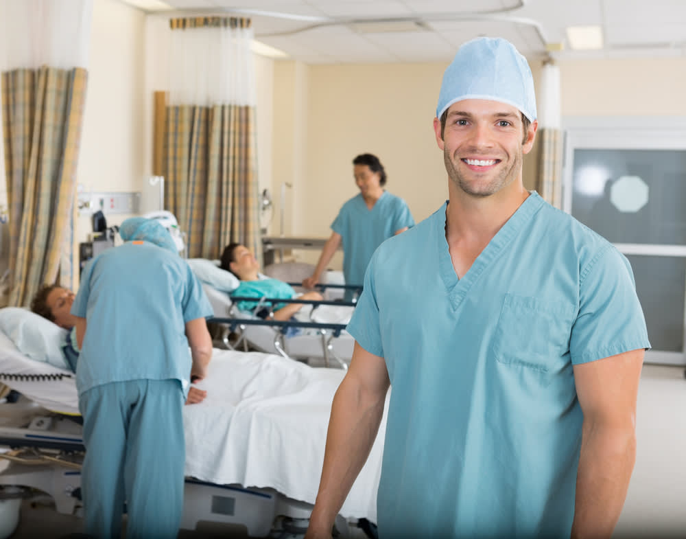 Step-down nurse standing in a ward