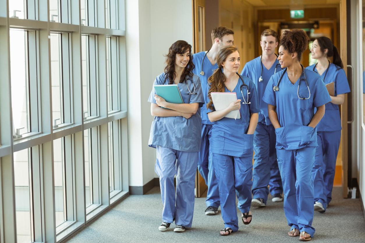 Nursing School students walking in the hospital