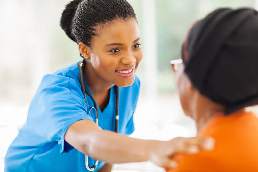 Nurse talking to a patient
