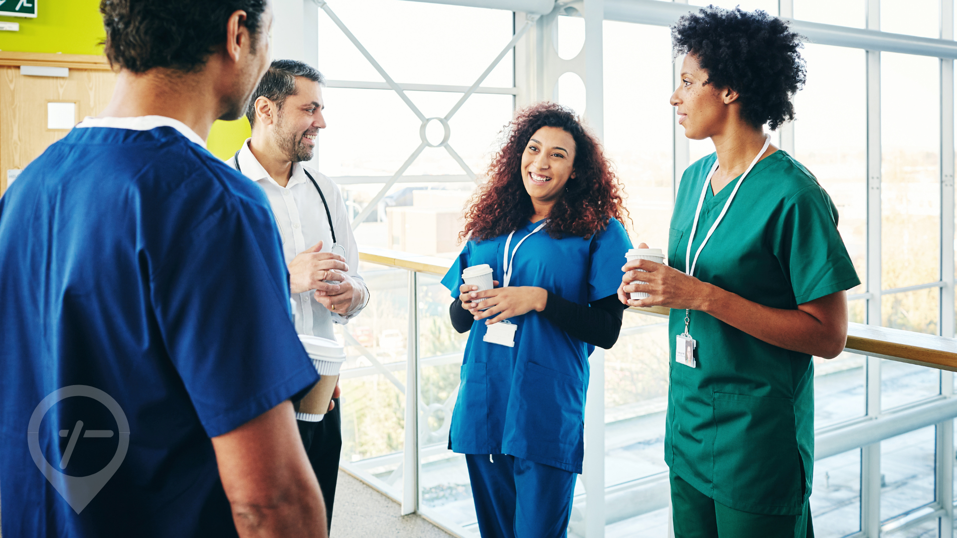 Group of nurses and doctor talk about nurse bullying at a hospital