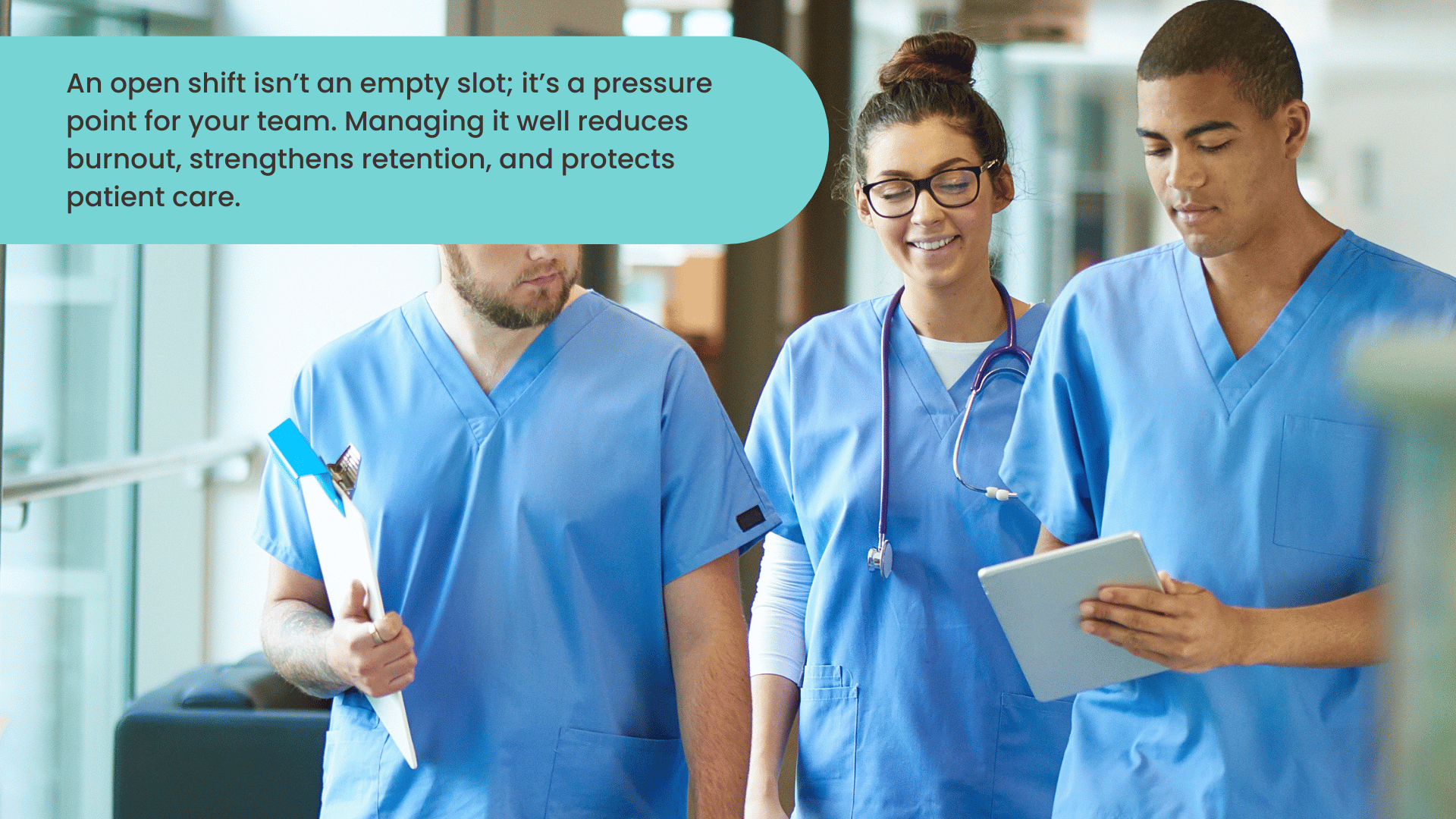 Nurses walking down hospital hallway during a shift, highlighting impact of open shifts on burnout and patient care.