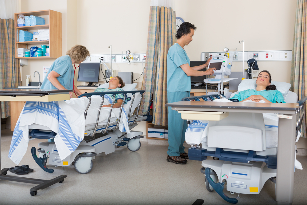 PACU Nurses monitoring patients in a PACU